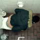 A hidden camera mounted on the ceiling of a public restroom records an unsuspecting brunette girl with tattoos on her back taking a shit into a toilet in 2 separate scenes. There is an annoying moving watermark, but still worth watching. Over 3.5 minutes.